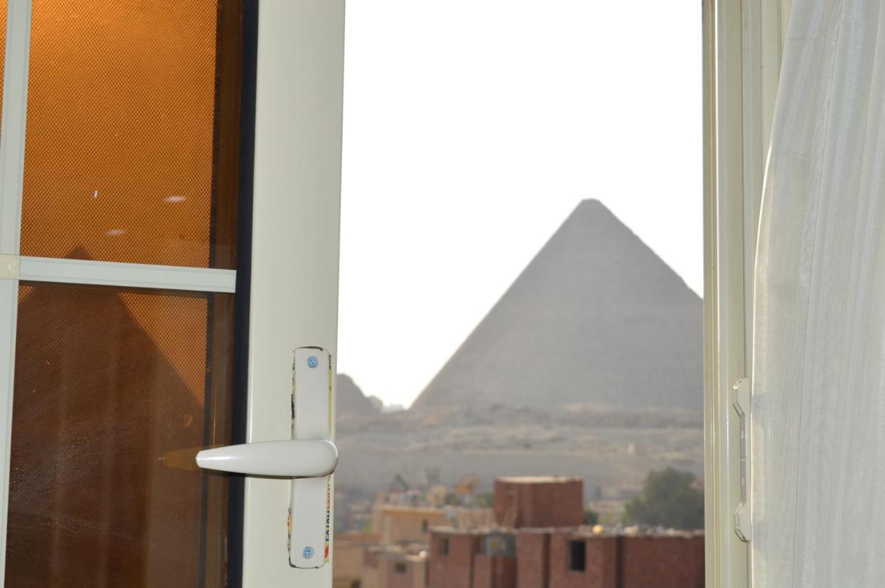 Hotel Magic Golden Pyramids View à Kafret el-Gabal Extérieur photo