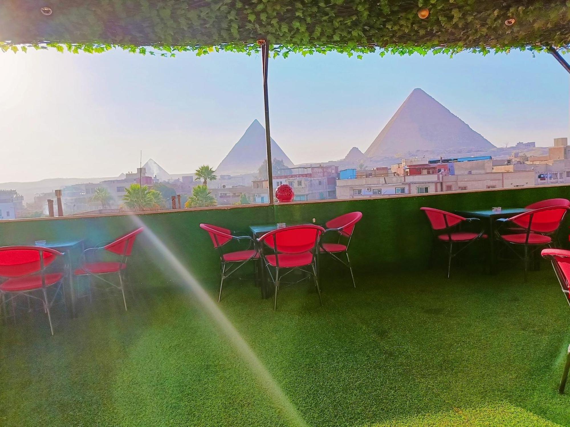 Hotel Magic Golden Pyramids View à Kafret el-Gabal Extérieur photo