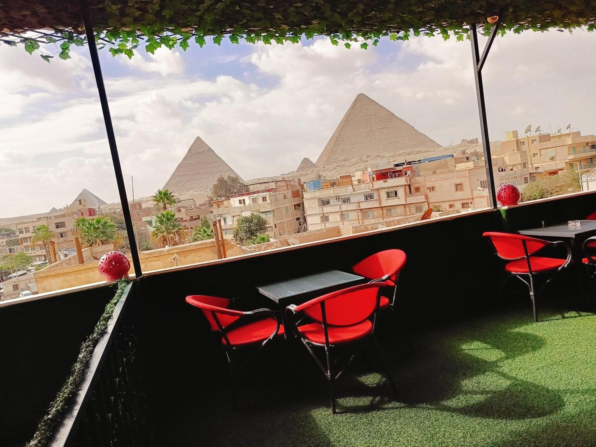 Hotel Magic Golden Pyramids View à Kafret el-Gabal Extérieur photo