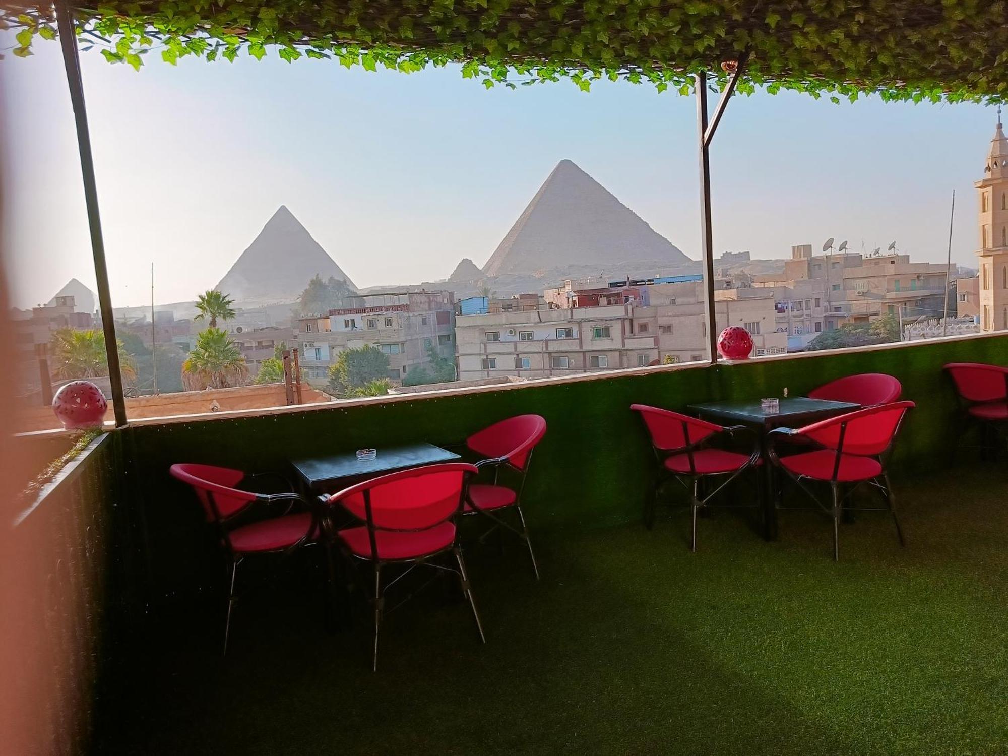 Hotel Magic Golden Pyramids View à Kafret el-Gabal Extérieur photo