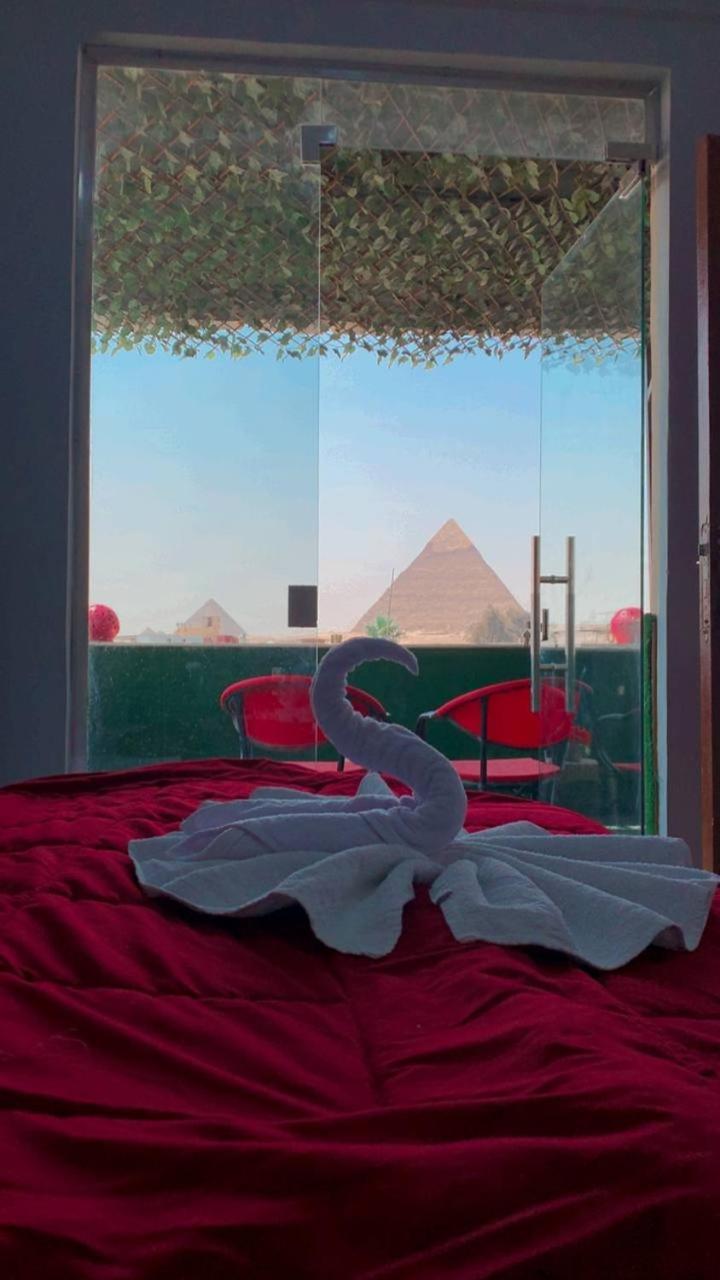 Hotel Magic Golden Pyramids View à Kafret el-Gabal Extérieur photo